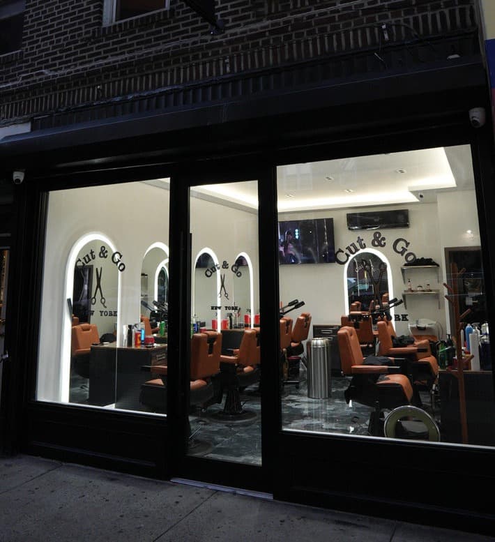 Inside the Cut & Go New York barbershop lounge